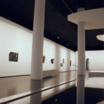 a modern museum with visitors inside